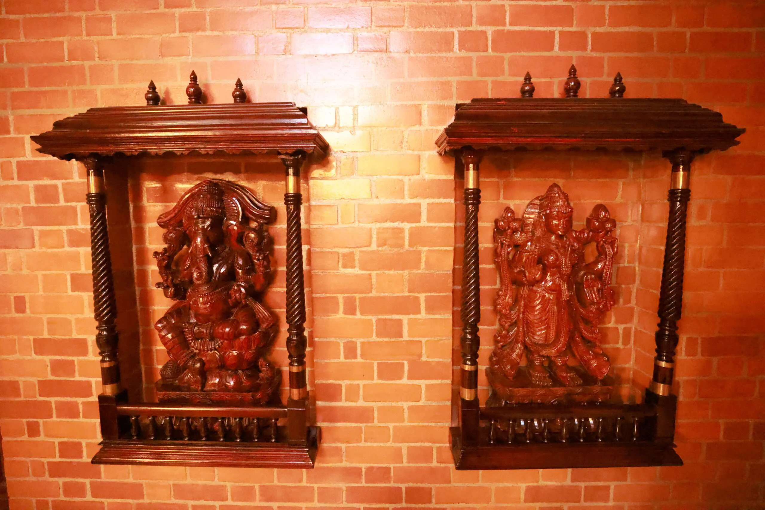 Handcrafted Heritage Wooden Idols in Alcoves